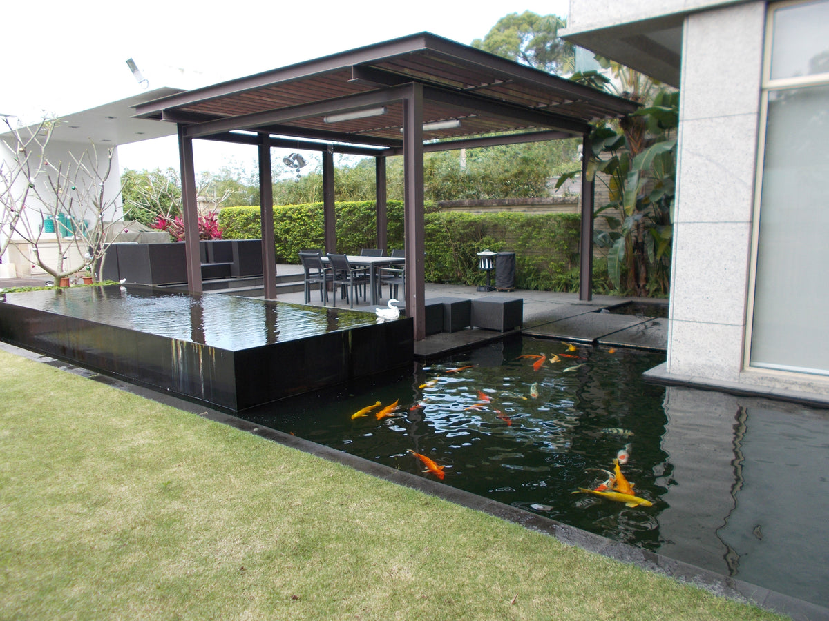 Modern outdoor setting with a pond